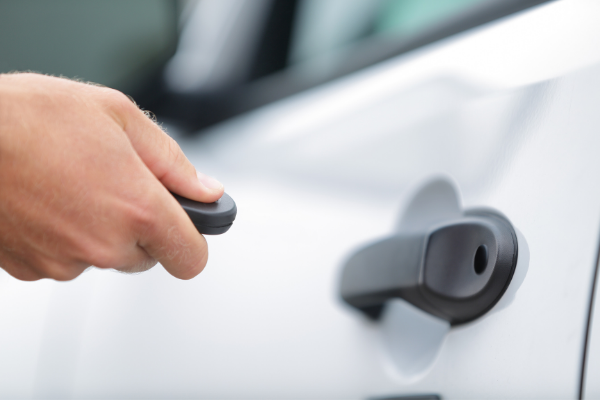 Person holding keyfob car