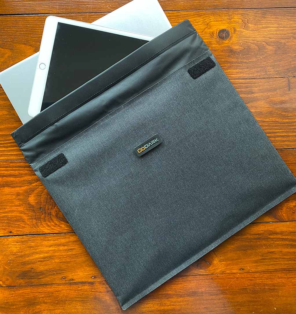 computer and ipad in laptop sleeve