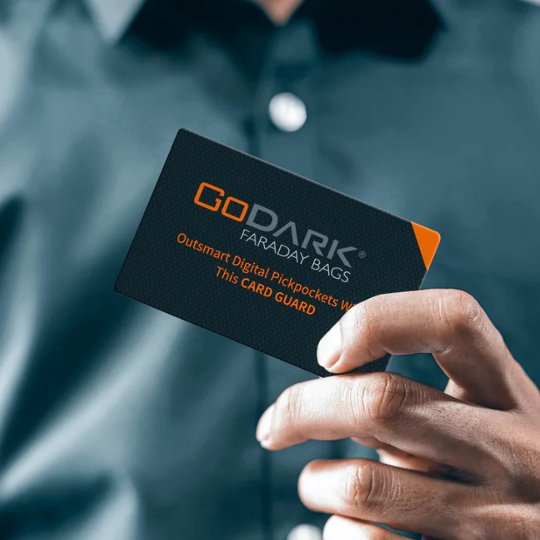 Man holding GoDark Card Guard