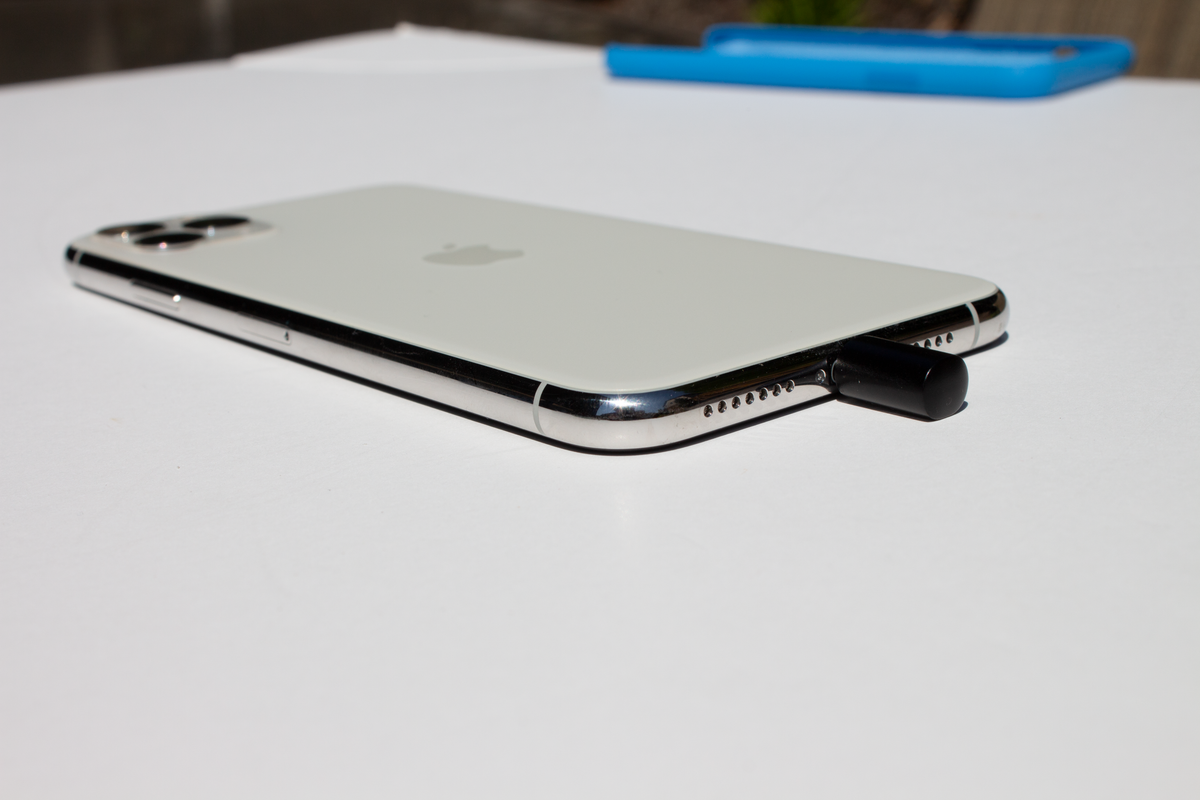 Mic-Lock Lightning plugged into iPhone