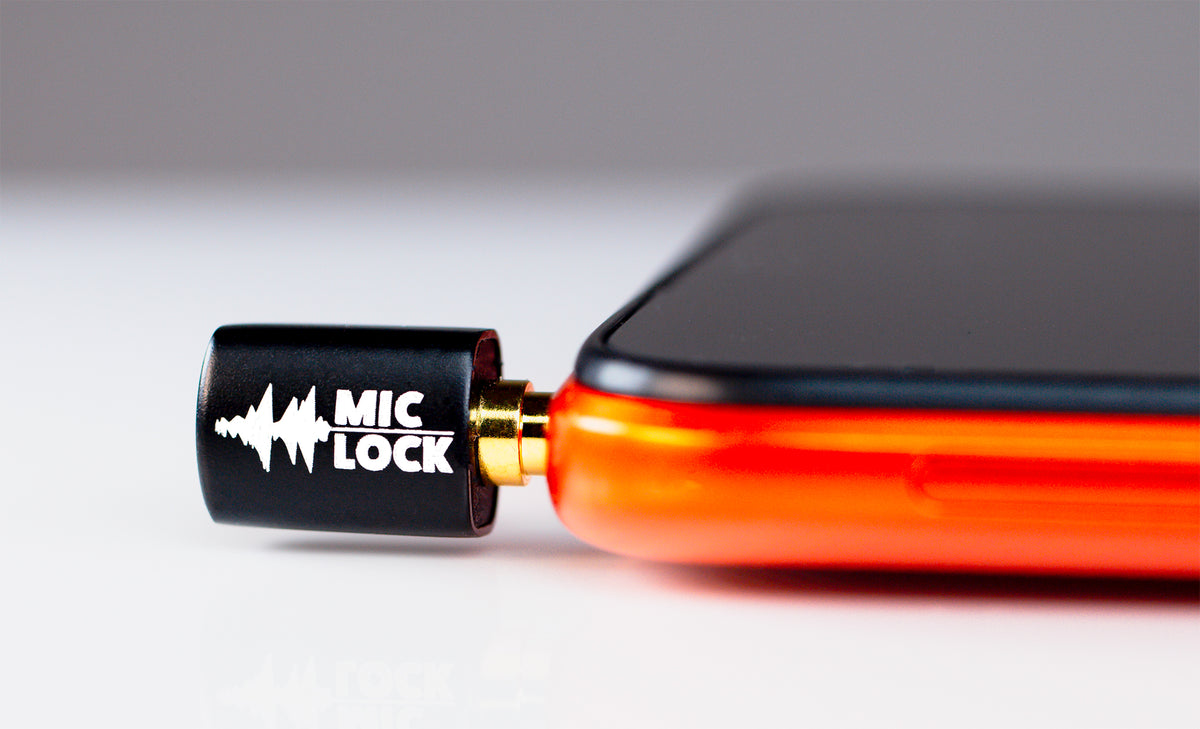Mic-Lock 3.5 mm plugged into orange phone